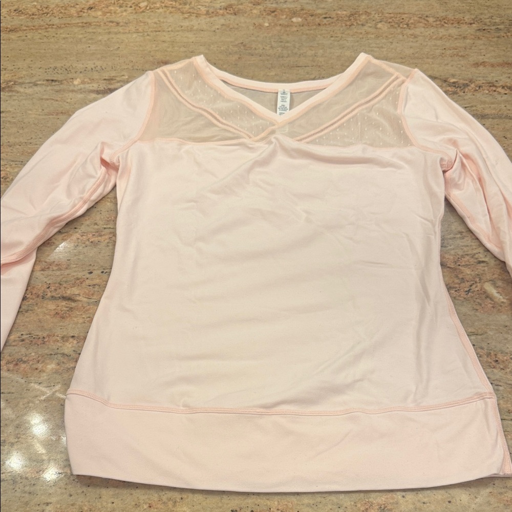 Lululemon Elegant Pink Women's Long Sleeve Top with sheer sections and detail